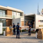 Professional JVC movers carefully packing, loading, and transporting household furniture and office items during a safe and organized relocation in Dubai.